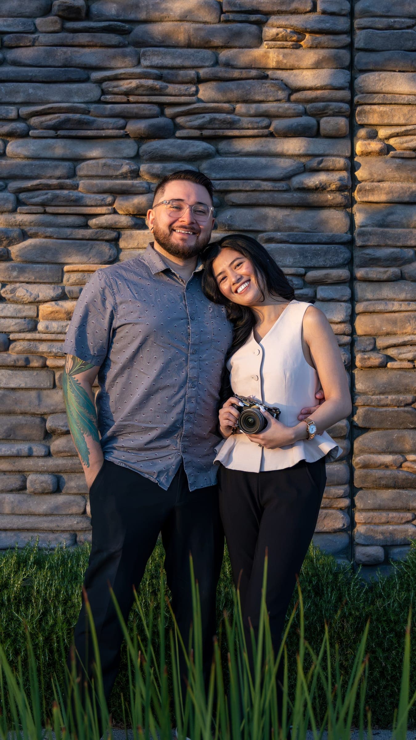 Reyes Media — couple outdoors with a camera